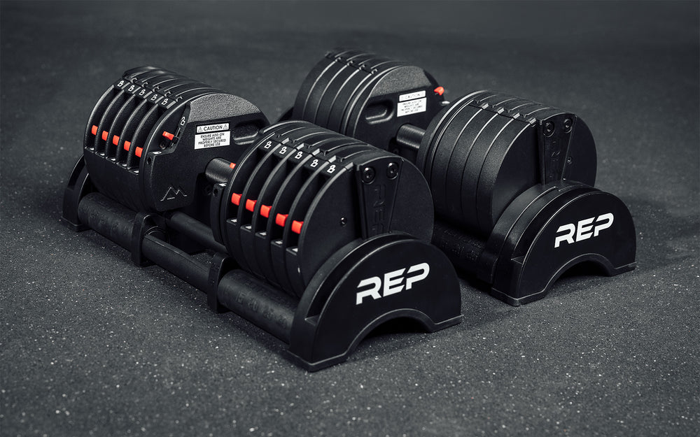 A pair of 30kg REP Fitness QuickDraw Adjustable Dumbbells (KG).