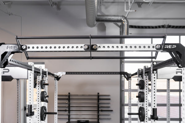 The REP Fitness Rack Crossmember Connectors installed between two PR-5000 racks