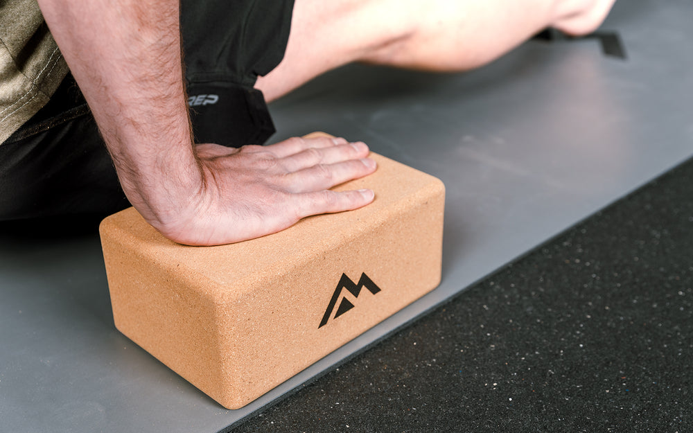 cork material up close with hands on blocks