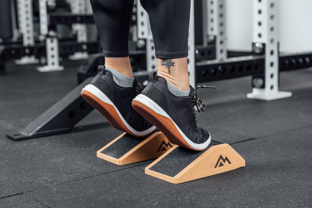 Athlete on their toes on the Cork Squat Wedge