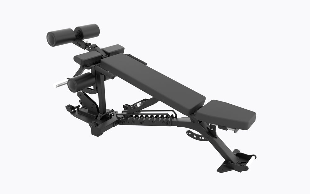 A 3/4 view of the REP Leg Curl/Leg Extension Bench Attachment attached to an adjustable weight bench. This angle highlights the Adjustable pads, Built-in Side Handles, and how the attachment integrates with an adjustable weight bench.