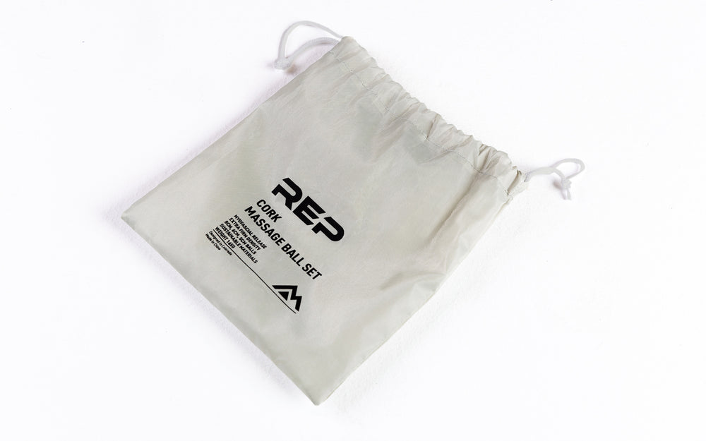 Studio-shot: REP Cork Massage Ball Set drawstring carrying bag.