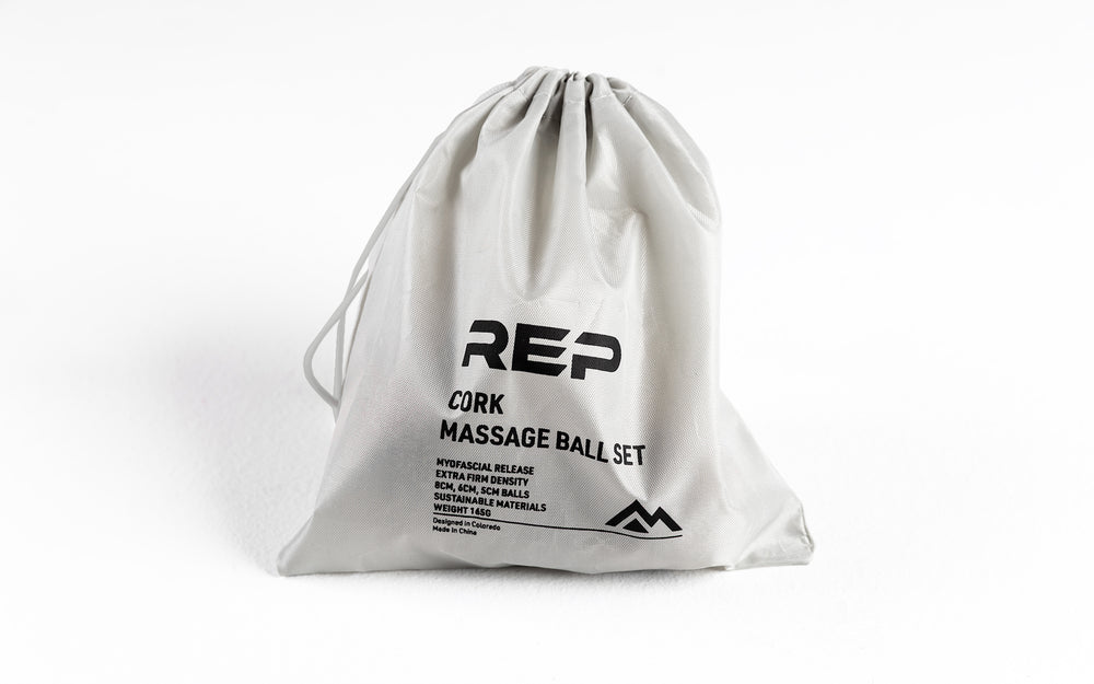 Studio-shot: REP Cork Massage Ball Set drawstring carrying bag closed with the balls inside.
