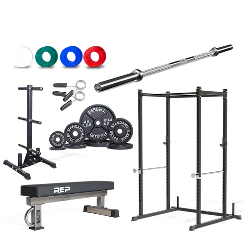 A power rack, barbell, plates, and bench