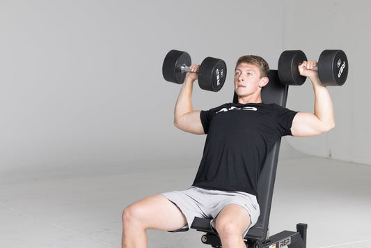 Man doing seated dumbbell press