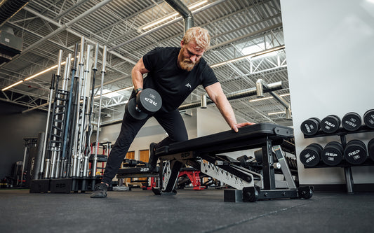 Lifter doing rows on a bench