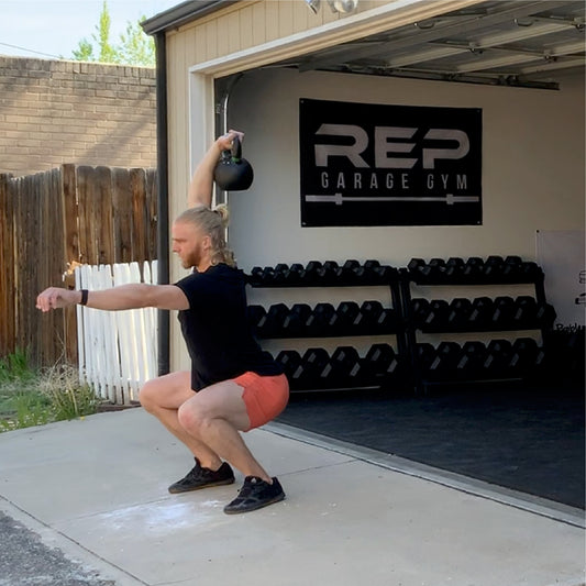 Man exercising with a kettlebell