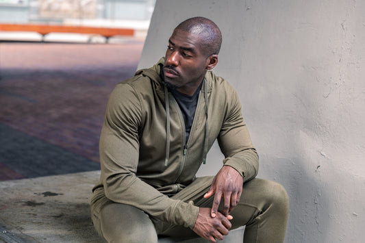 Athlete recovers in REP apparel.