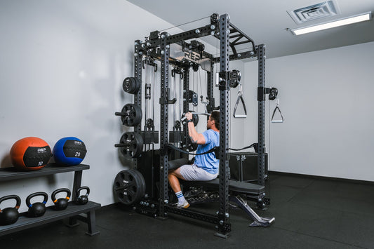 Man doing lat pulldowns on an Ares