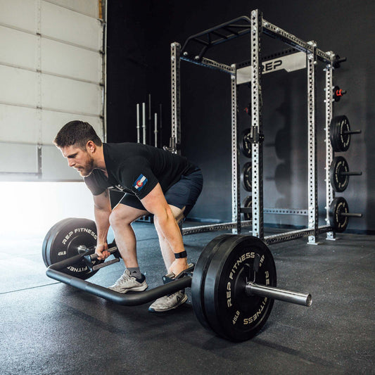 Man doing trap bar deadlifts