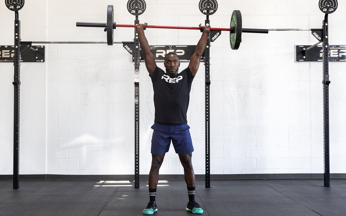 Man lifting with a REP barbell