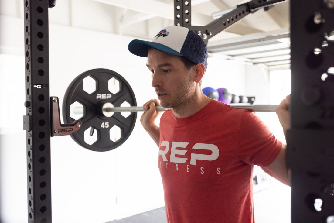 Man getting ready to do barbell squats
