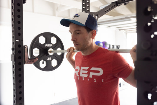 Man getting ready to do barbell squats