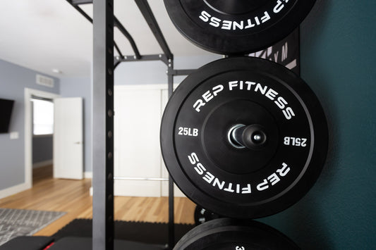 A home gym and gym equipment by a Christmas tree