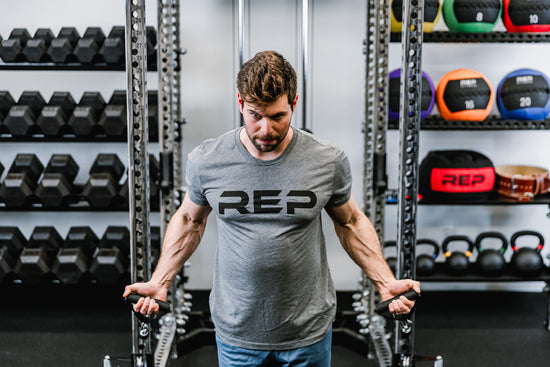 Lifter doing cable exercises