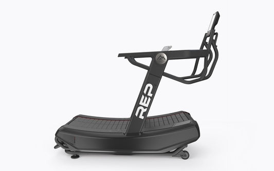A shot of the Strive Series Curved Treadmill on a white background.