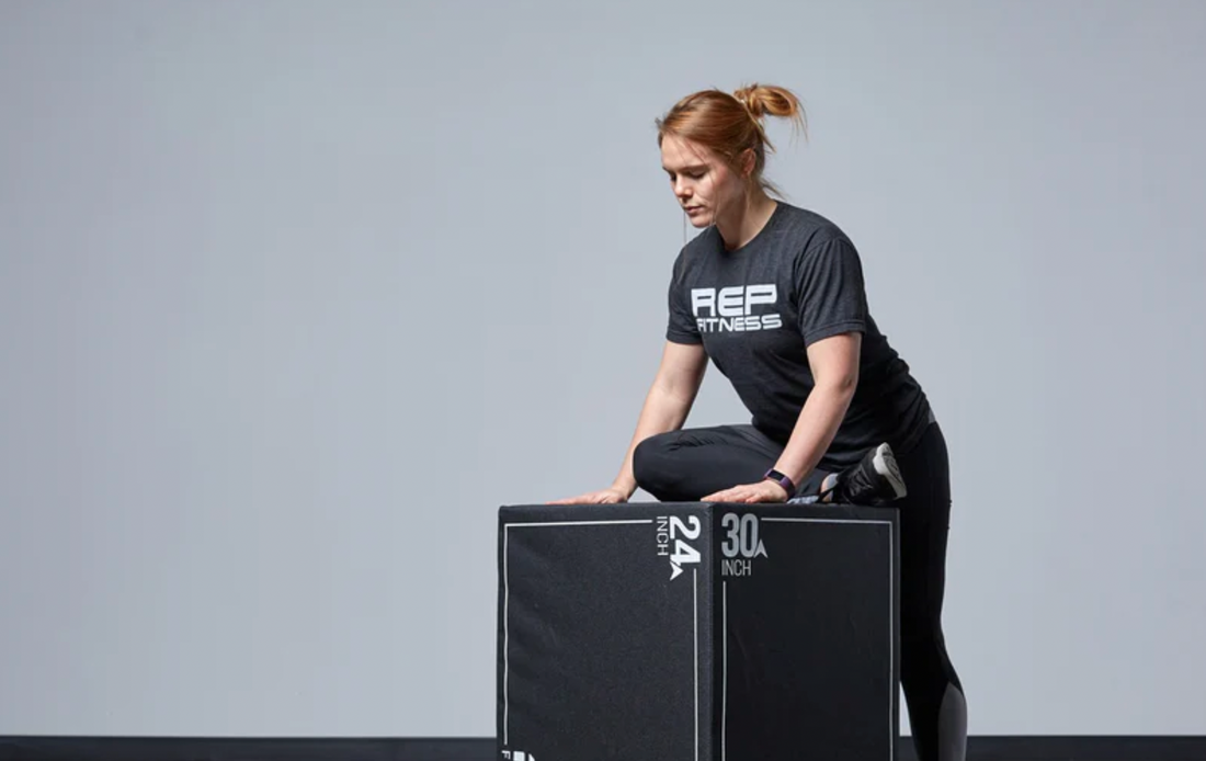 Woman on a soft plyo box