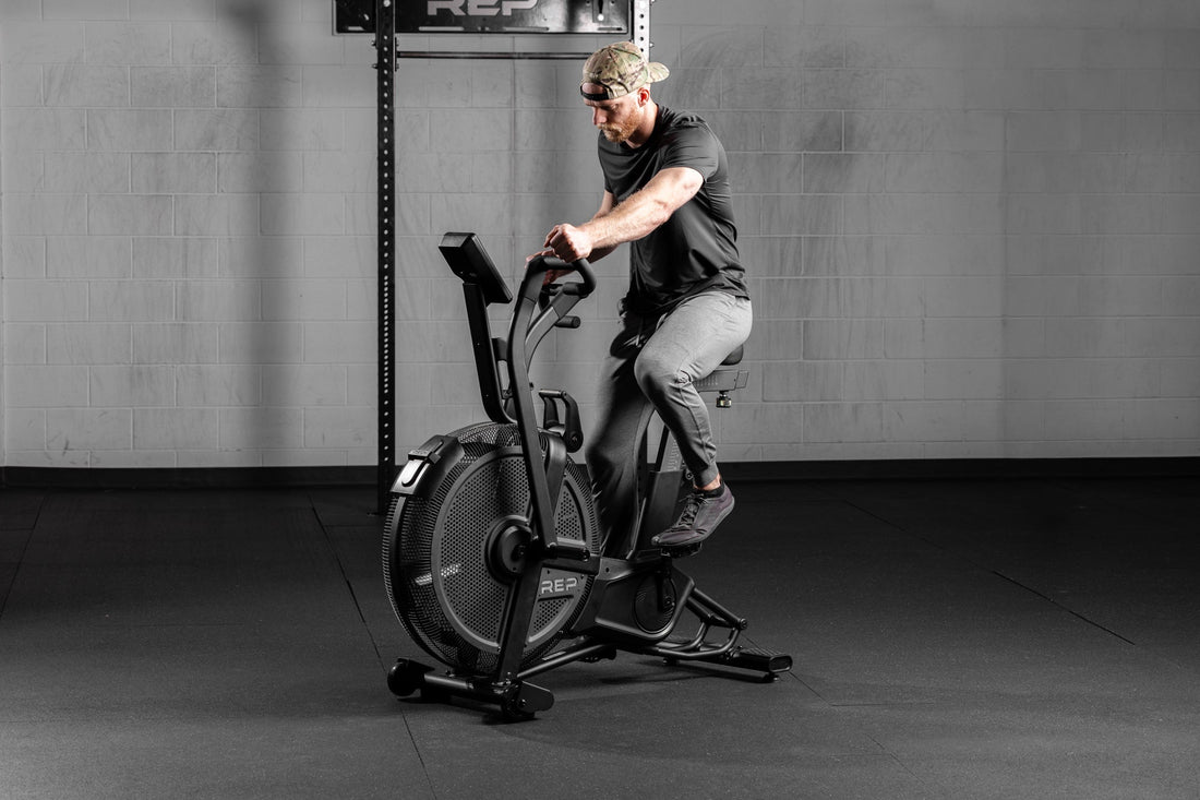 Athlete working out on the Strive™ Air Bike featuring VPR™.