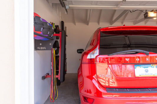 A car parked in a compact garage gym