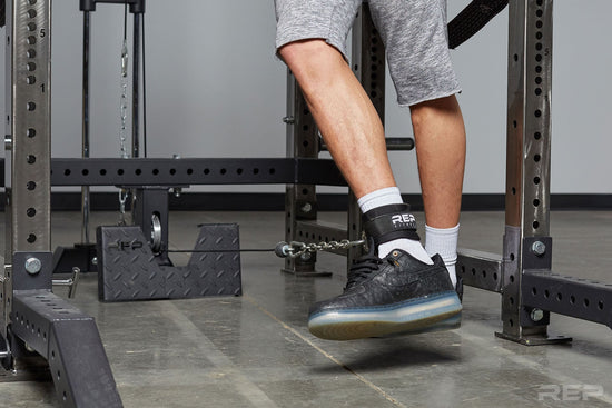 Lifter doing exercises with an ankle cuff