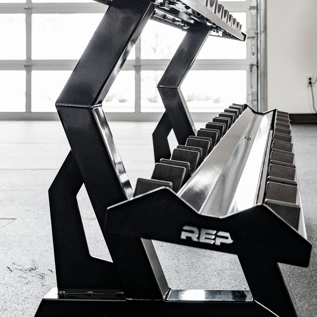 Side profile of the REP Fitness 2-Tier Commercial Dumbbell Rack for round dumbbells