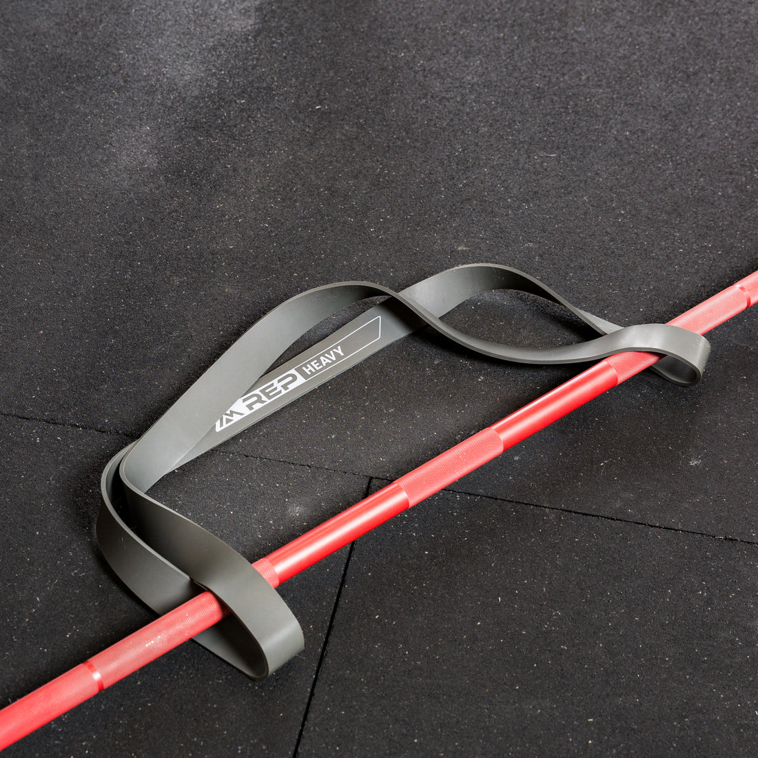 The REP Fitness Resistance Bands 2.0 Heavy on barbell