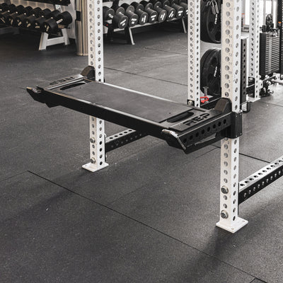 The REP Fitness Utility Bench installed on the standard length Spotter Arms 2.0