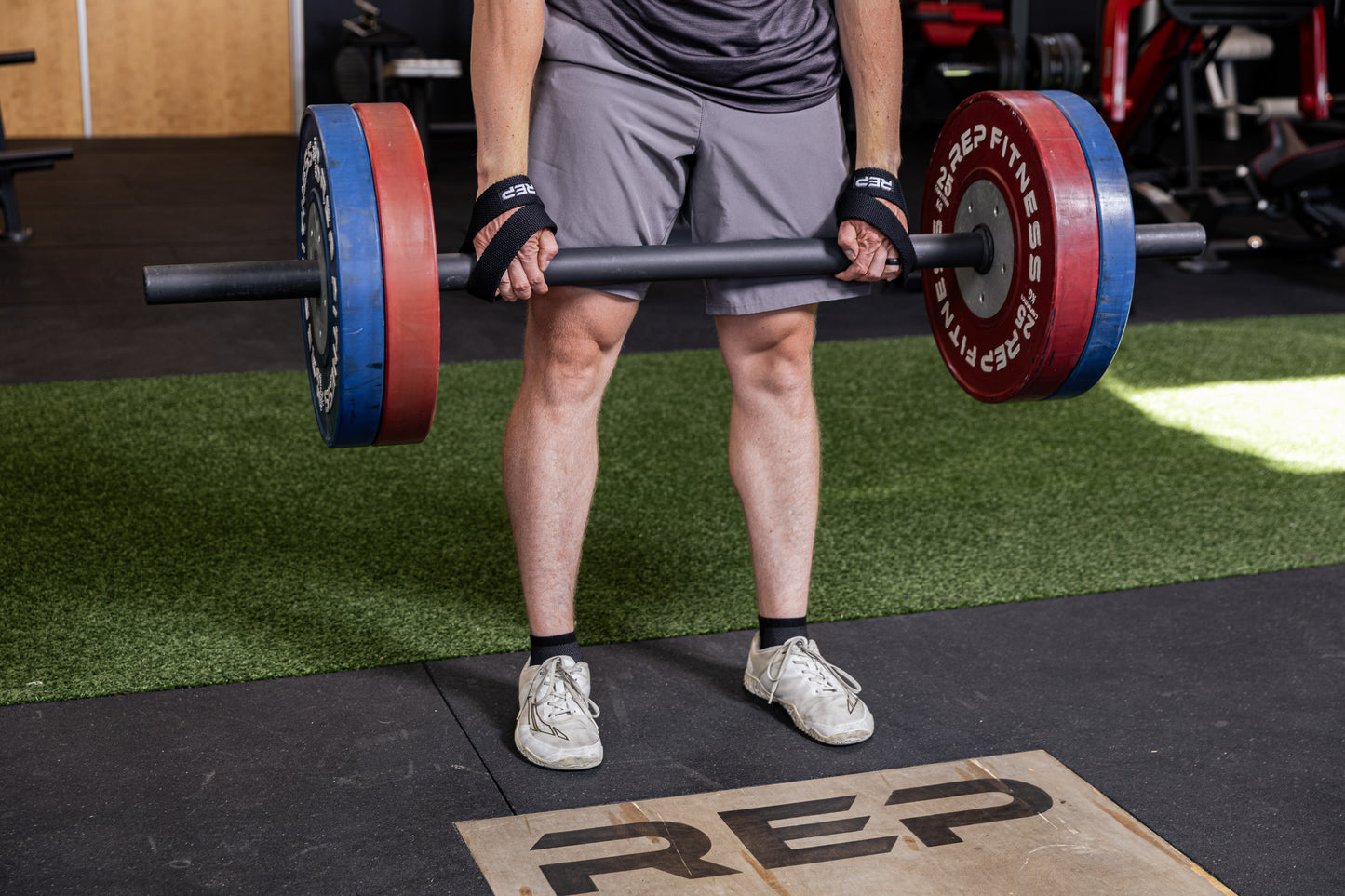 Athlete using the REP Fitness figure 8 lifting straps