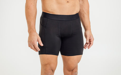 Front view of model wearing the REP Virtus Light Compression Shorts.