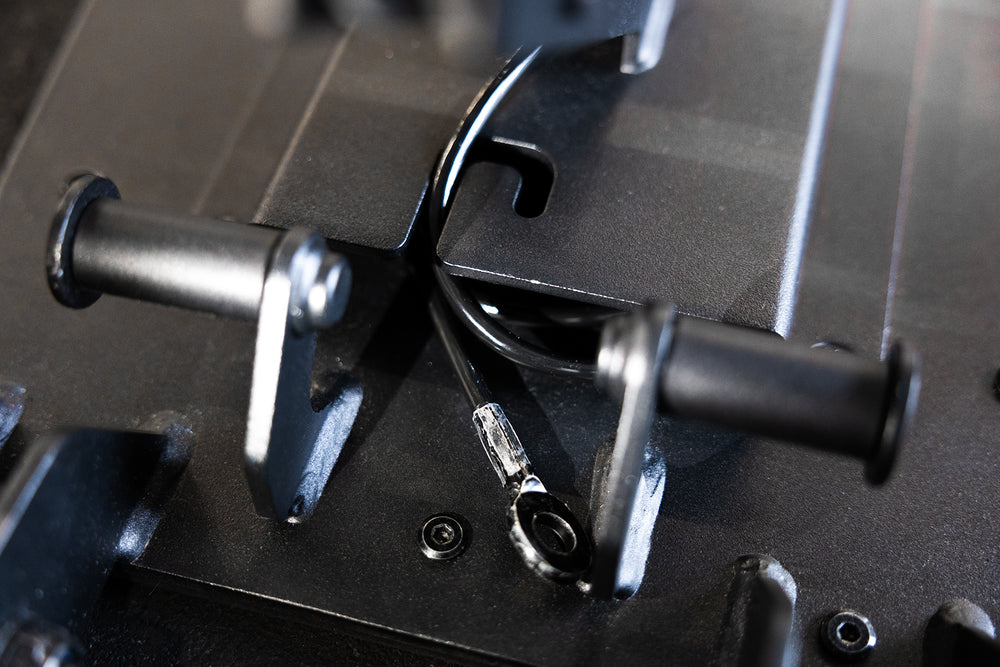 Close-up shot of the cable being stored inside the cable housing