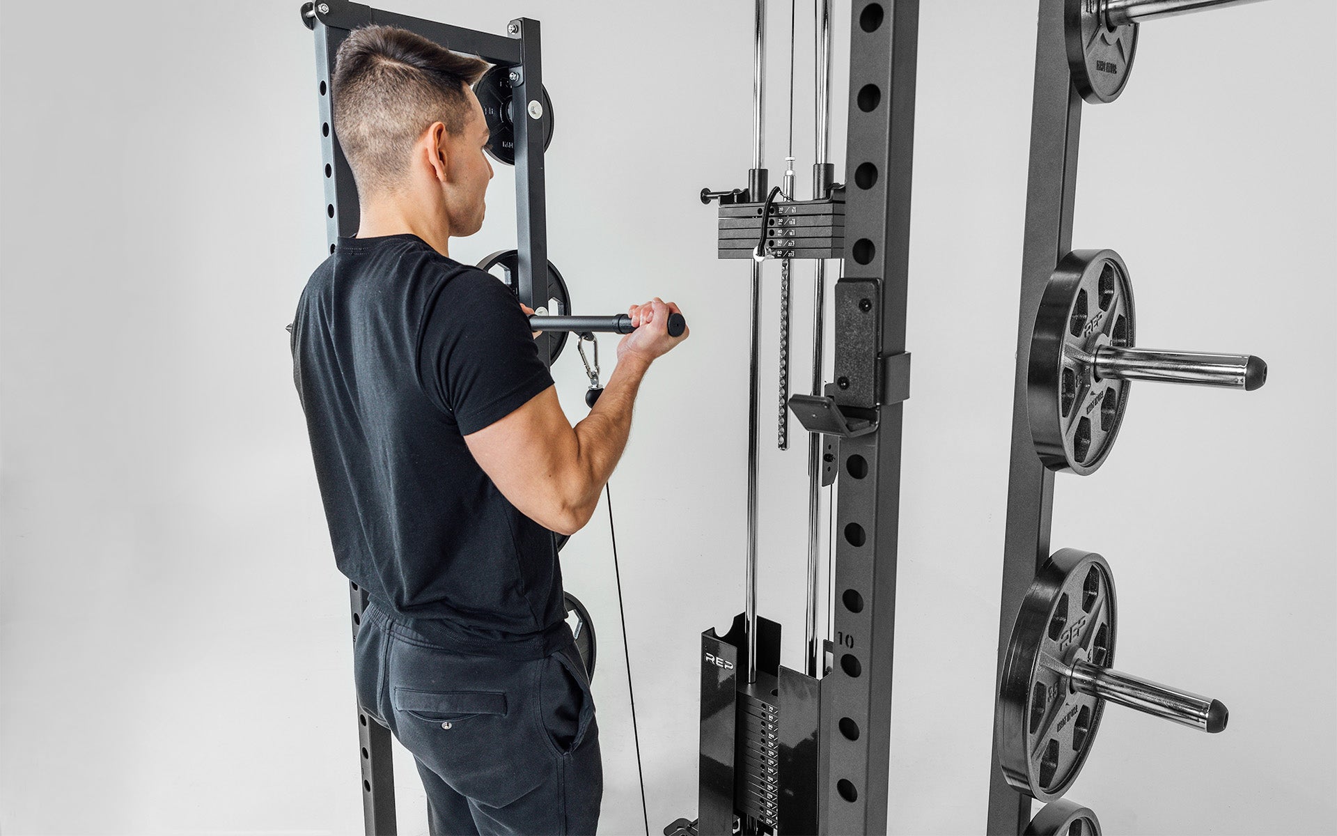 Selectorized Lat Pulldown and Low Row (1000 Series) Being Used For Bicep Curls