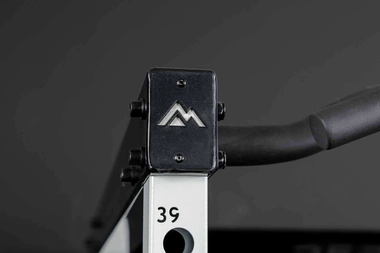 Close-up shot of the branded crossmembers on the REP Fitness Altitude™ Power Rack