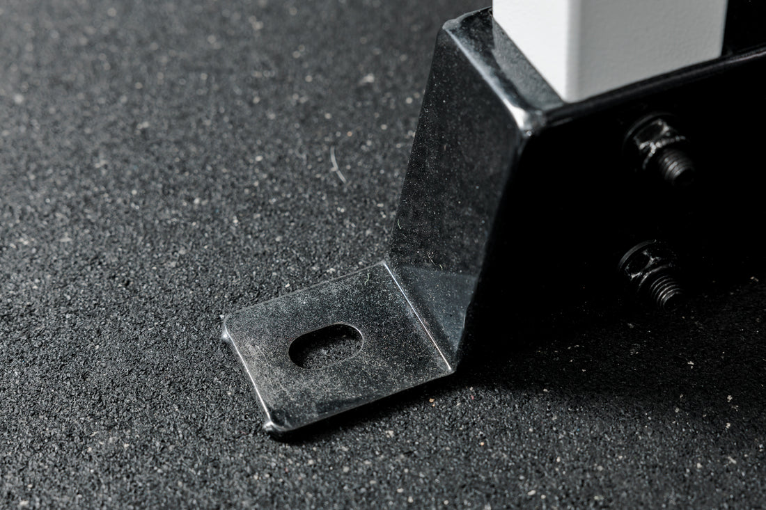 Shot of the bolt-down holes on the footplate of the REP Fitness Altitude™ Power Rack