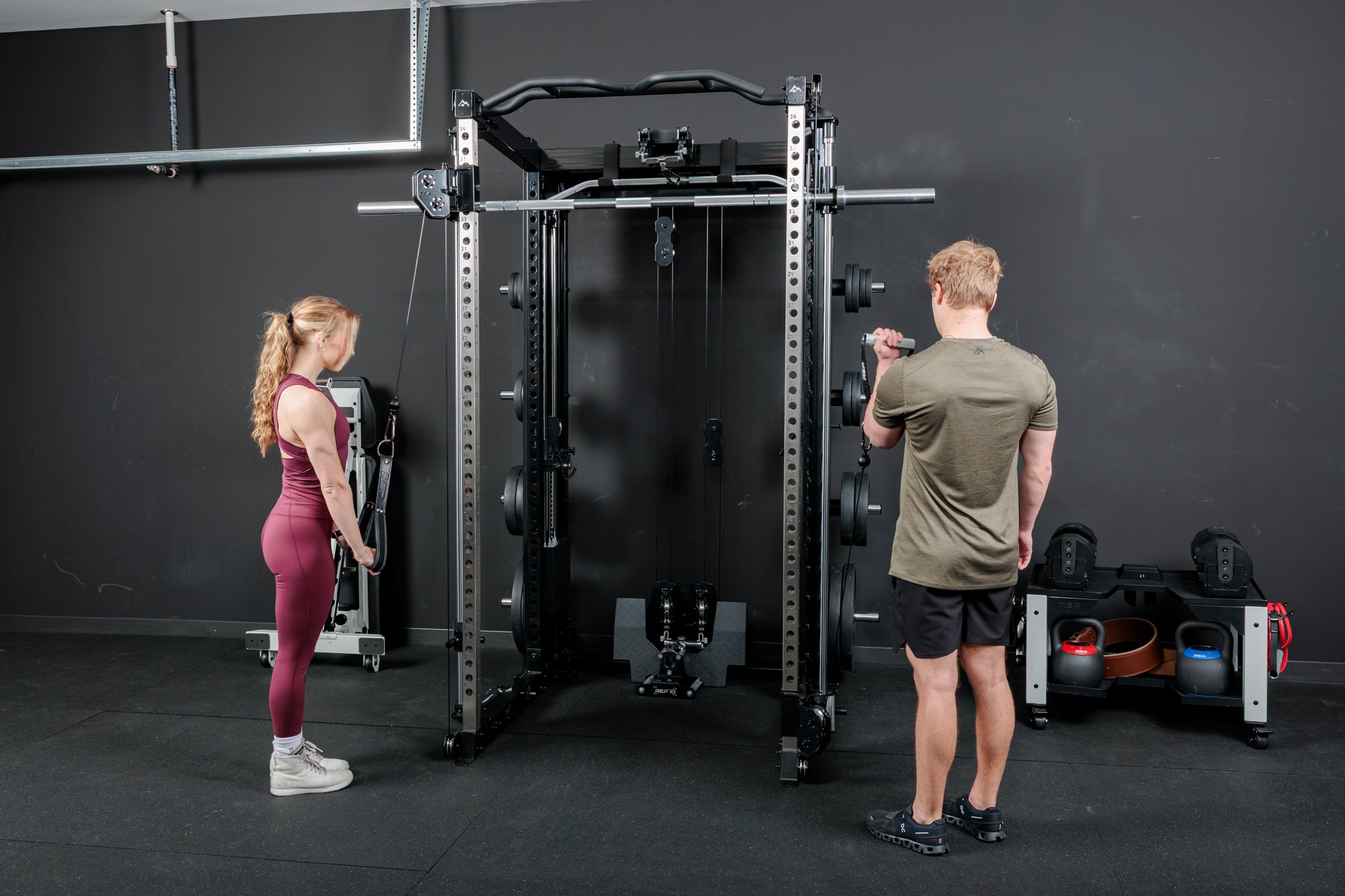 Two athletes using the REP Fitness Altitude™ Cable Machine Attachment at the same time