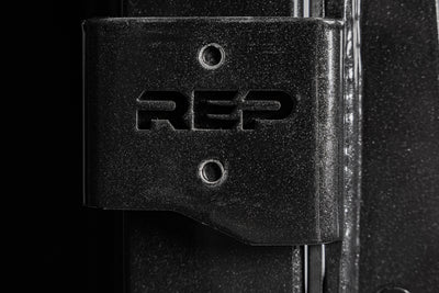 Close-up shot of the laser-cut branding on the REP Fitness Altitude™ J-Cups