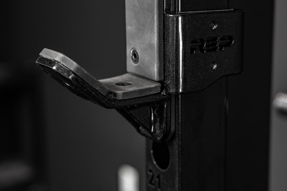 Close-up shot of the branding on the REP Fitness Altitude™ J-Cups right side