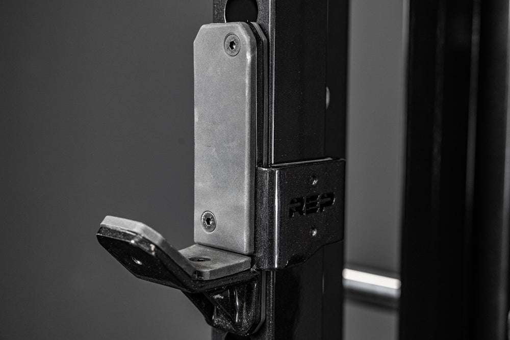 REP Fitness Altitude™ J-Cups installed on a rack upright