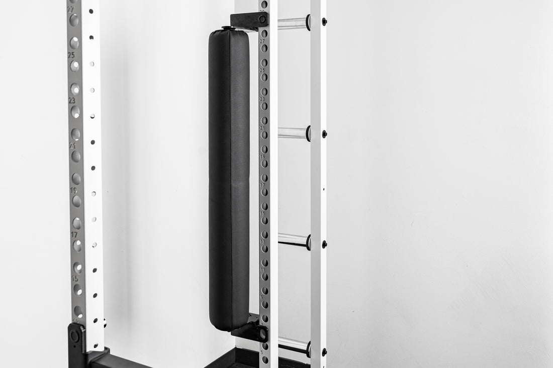 Rendering of the REP Fitness Altitude™ Leg Roller installed on the rack upright for vertical storage