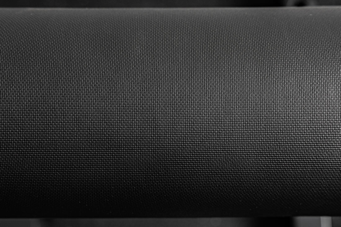 Close-up of the REP Fitness Altitude™ Leg Roller pad fabric