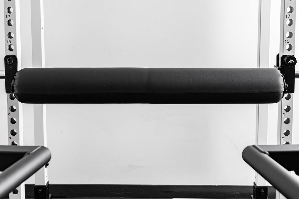 Rendering of the REP Fitness Altitude™ Leg Roller installed between the rack uprights for use