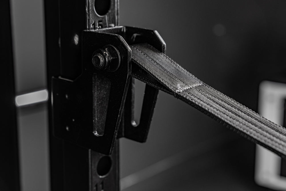 REP Fitness Altitude™ Power Rack Strap Safeties installed on the rack uprights