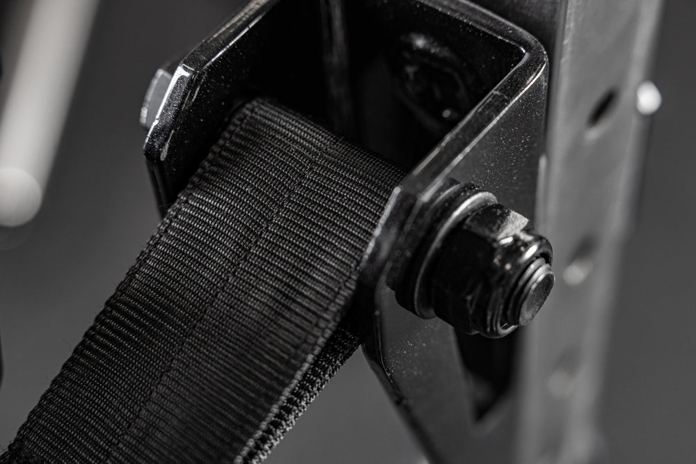 Close-up of the REP Fitness Altitude™ Power Rack Strap Safeties bolt hardware