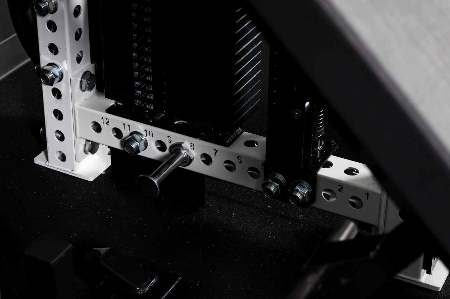 Close-up of the new 26" crossmember on the PR-5000 that allows both the Athena and Smith Machine Rack Attachment on a 4-Post rack.