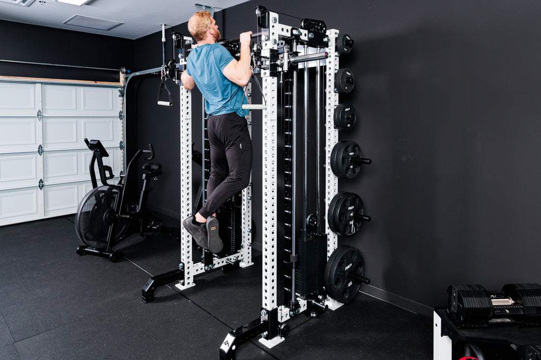 Person performing pull-ups on the Summit™ All-In-One Athena™ .