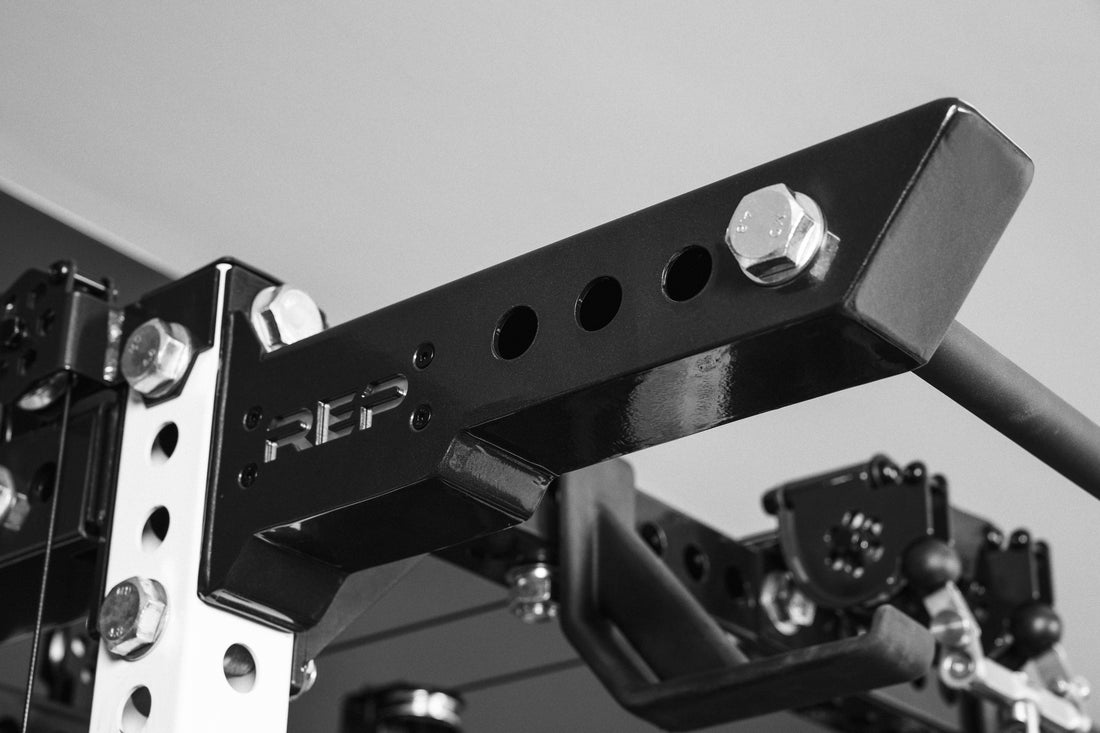 Close-Up of Pull-Up Bar Extension Brackets With Ares 2.0 4-Post Pull-Up Bar with REP branding
