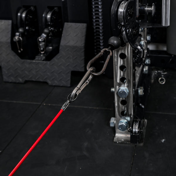 Leg Extension & Leg Curl Bench Attachment Cable Kit with the cable attached to a cable system