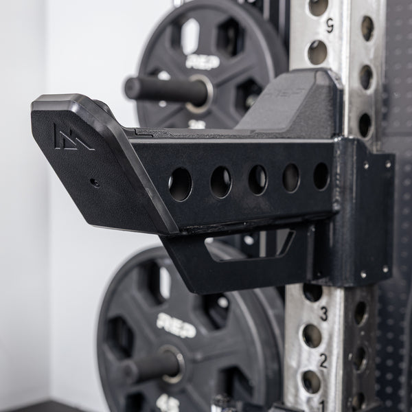 Close-up of the REP branding on the front of the Spotter Arms 2.0