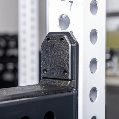 Close-up shot of the protective liners on the raised sides of REP Fitness Flip-Down Safeties 2.0