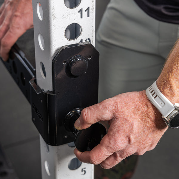 Athlete interacting with the pop pin on the Flip-Down Safeties 2.0