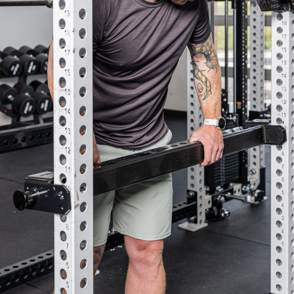 Athlete installing with the Flip-Down Safeties 2.0 on a PR-5000